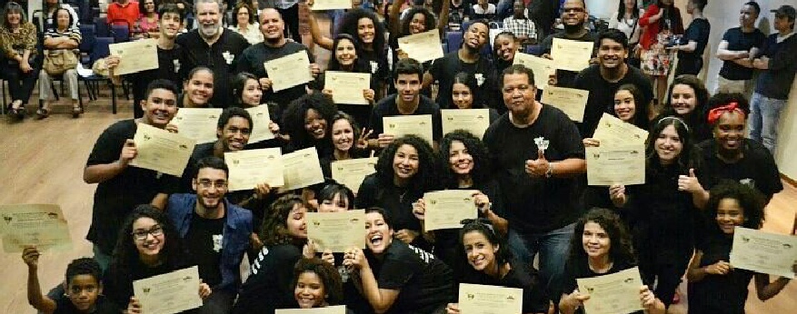 A CAT group smiling with their certificates.